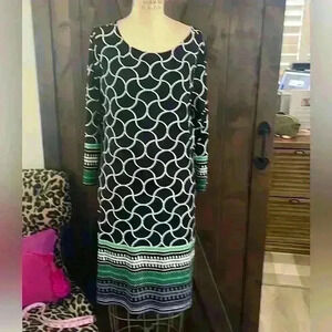 Hannibal 3/4 sleeve Navy dress with cute printed borders on sleeves and hem.